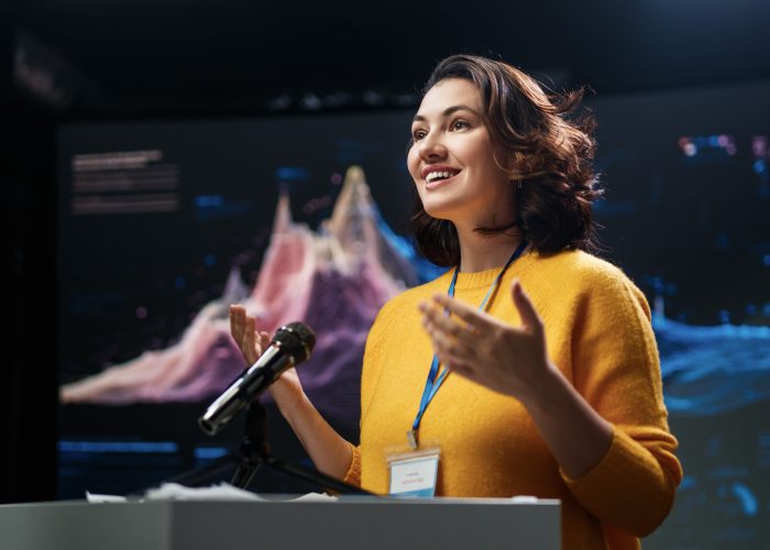 Businesswoman presenting at a product launch