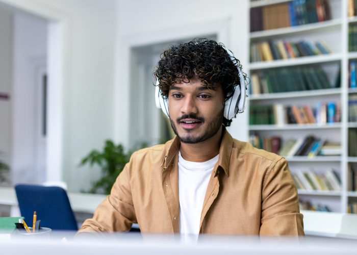 Employee attending a live training broadcast remotely